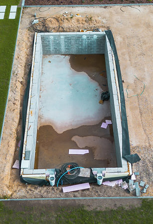 backyard-garden-with-partially-built-swimming-pool.jpg
