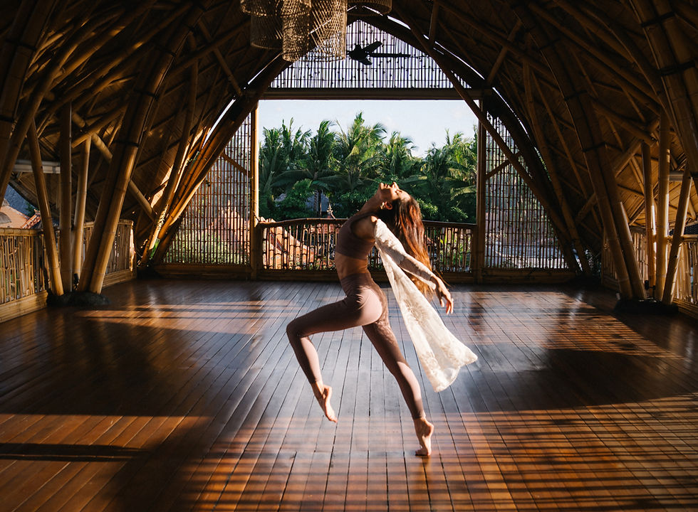 Embracing the freedom of movement, Masha moves with ease in a beautiful bamboo hall, illuminated by the warm sunlight.