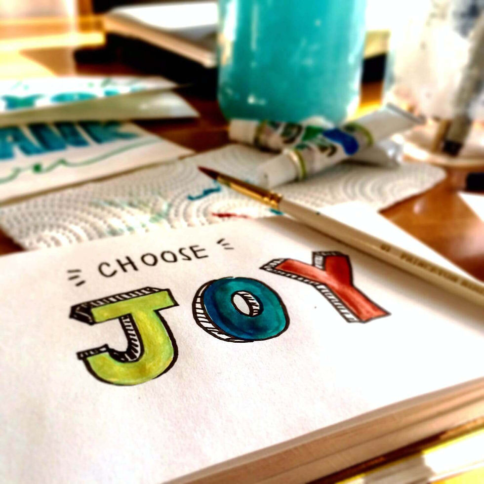 The word "joy" in a notebook
