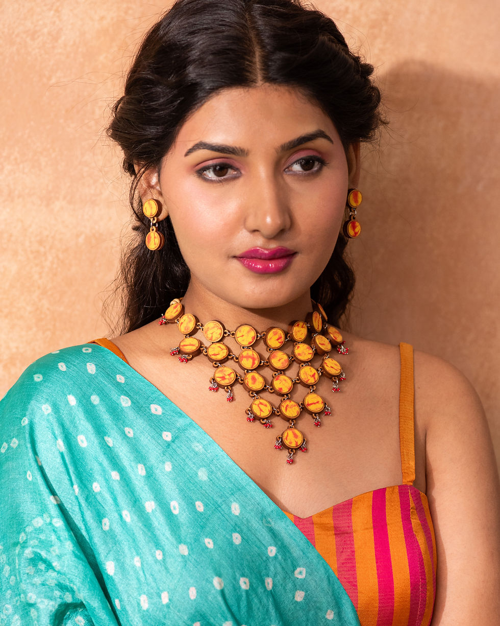 Thumbnail: WHE Handcrafted Yellow Orange Tie and Dye Repurposed Wood and Fabric Earrings