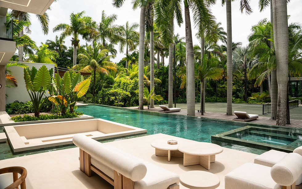 Modern poolside lounge with palm trees and tropical garden