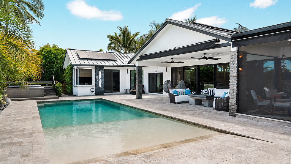 Modern pool and patio area at Bocaire Residence.