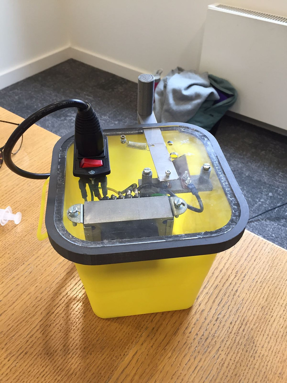 Needle destroyer prototype — 3D printed rim makes it adjustable to the sharps container.