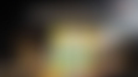 Nuova cold-pressed groundnut, coconut, and flaxseed oils arranged as a thoughtful winter gift in a warm kitchen setting with traditional utensils, highlighting healthy cooking oils for winter wellness and festive nourishment.