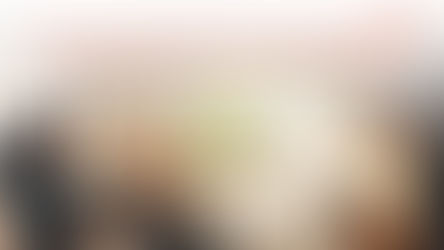 An Women Taking Oil Bottle for cooking