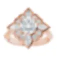 Thumbnail: Pear and round  diamond halo engagement ring with a round brilliant lab grown diamond center.