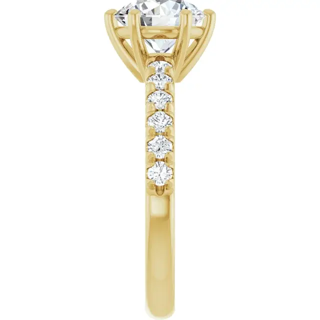 Thumbnail: 6 prong round solitaire engagement ring set with lab grown diamonds and a pave band.
