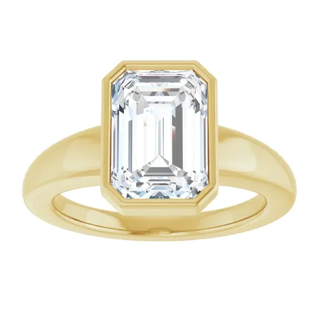 Emerald cut bezel solitaire engagement ring in yellow gold