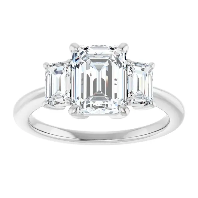 Thumbnail: Art deco three stone engagement ring, set with three lab grown emerald cut diamonds.