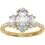 Thumbnail: A three stone moval lab grown diamond engagement ring, with pavé diamonds on the band made in 14k yellow gold.