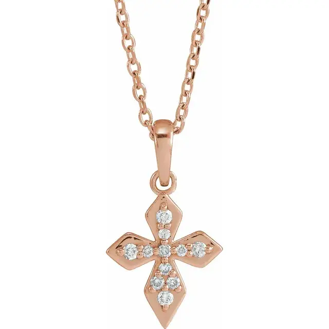 Thumbnail: Dainty Diamond Cross Necklace set with lab grown diamonds in 14k solid gold.