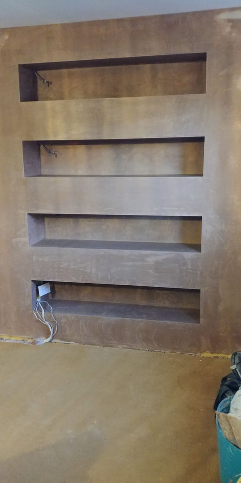 Contemporary living room feature wall with storage