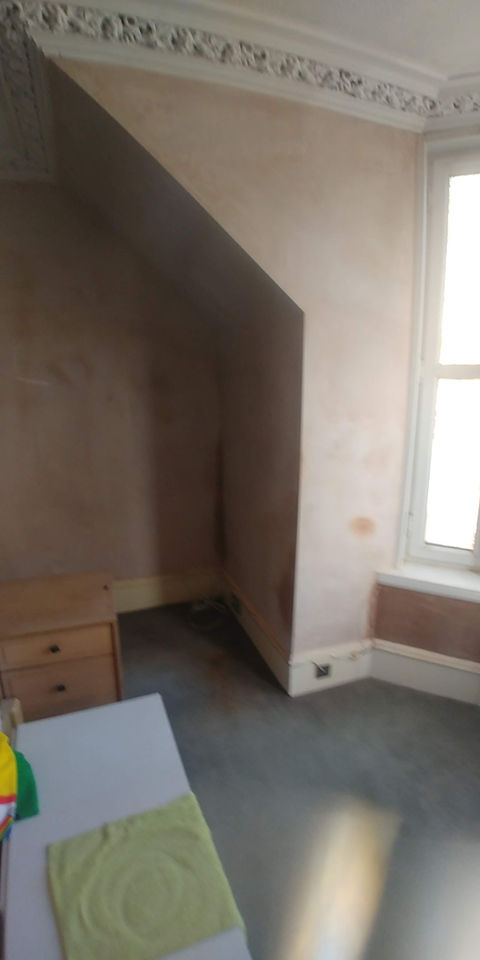 Bedroom with bay window and alcove was re-plastered. Old wooden staff beads were replaced with new beading to create a seamless finish