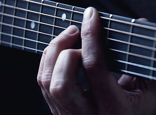 Hands on Guitar Strings