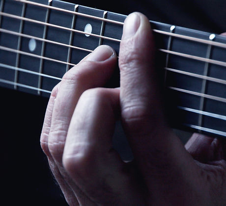 Hands on Guitar Strings