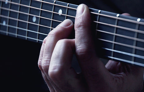 Hands on Guitar Strings