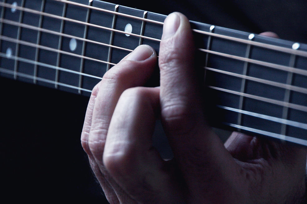 Hands on Guitar Strings