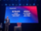 Harry Allen, with a slide explaining Belmont’s addition of 450+ faculty and staff since 2021. (Olivia Abernathy)