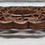 Thumbnail: Wooden Hand Carved Trivet Honeycomb Center surrounded In Floral Patterns Size:6"