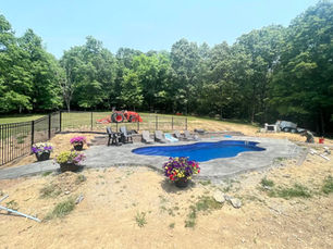 Professional concrete grading work in progress showing proper slope installation for Pittsburgh home drainage