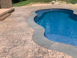 Professional concrete grading work showing proper slope installation for Pittsburgh home drainage protection