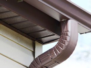 Shur Flo gutter guards installed on Pittsburgh home showing aluminum micro-perforated design protecting gutters from leaves