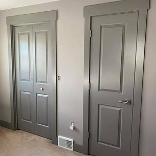 Professional interior house painters working in Greensburg PA home with quality brushes and equipment