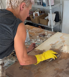 Sarita applying paint
