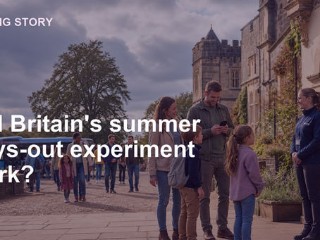 Illustrative families arriving at a fictional British heritage attraction on a late-summer day.