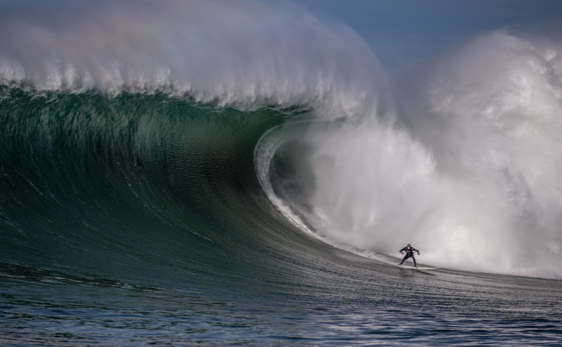 Shawn Dollar surfing.