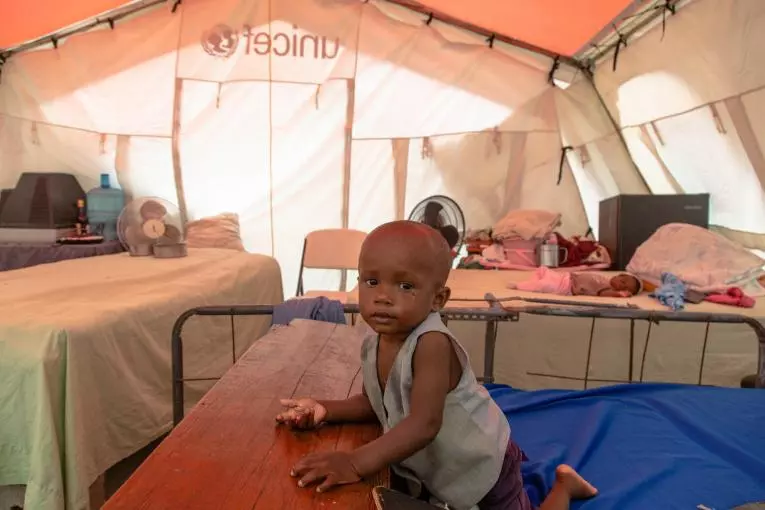 A 15-month-old child in a UNICEF-supplied tent in Les Cayes, Haiti.