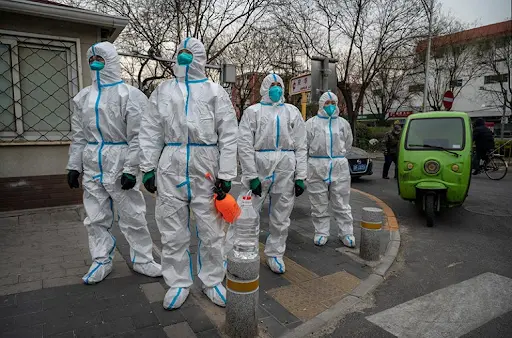 Full PPE is still being used in China’s locked-down cities