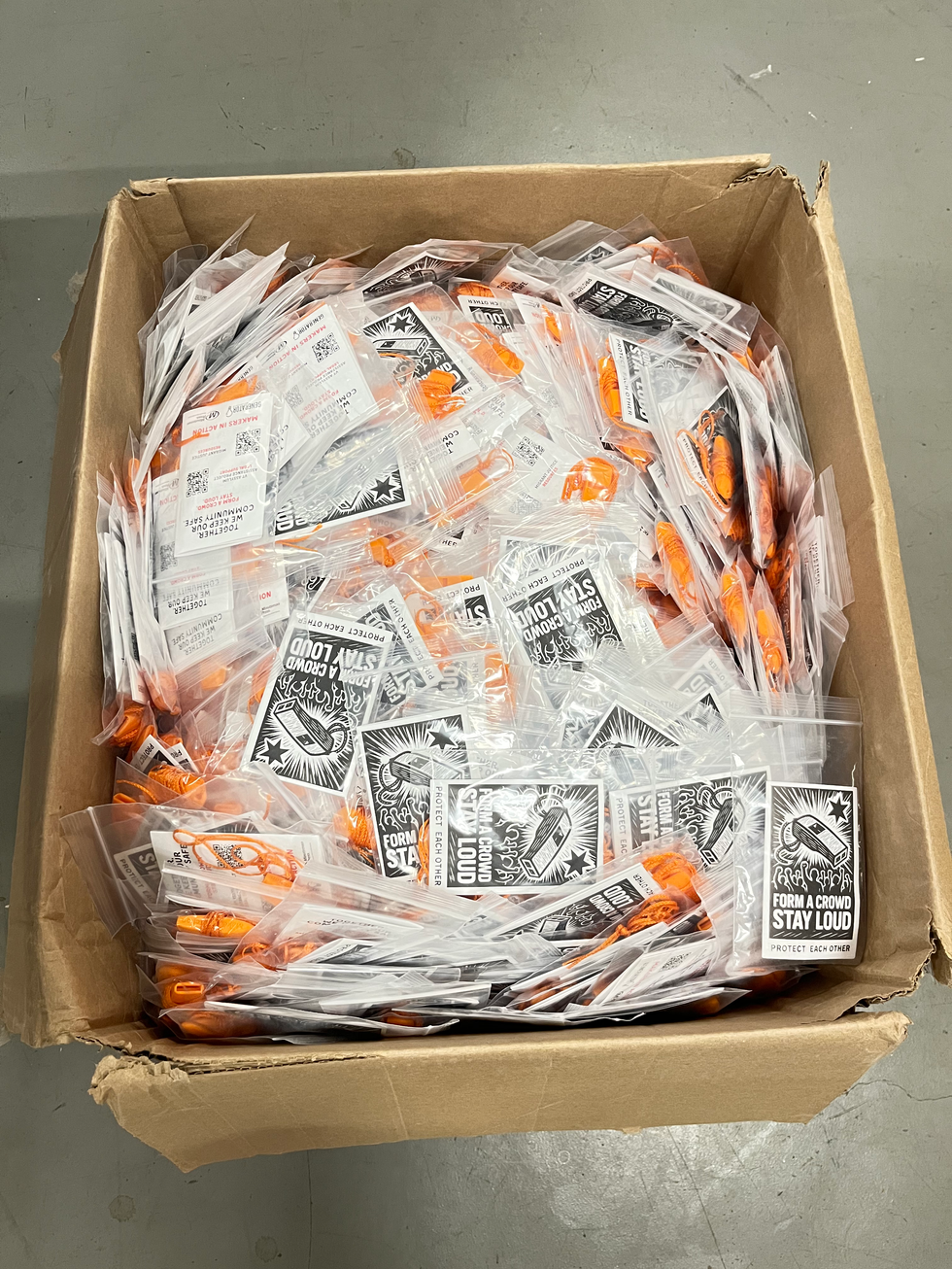box of packaged anti-ice whistles