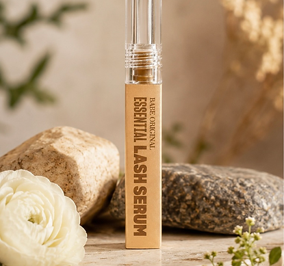 Babe Original Essential Lash Serum displayed in a soft botanical setting at Wild Flower Esthetics Spa. Professional lash growth serum designed to support the appearance of longer, fuller looking natural lashes and healthy lash growth for clients in Augusta, GA