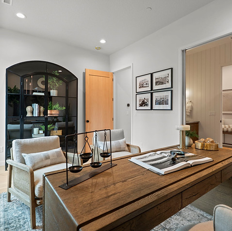 KUPARI home office with warm wood finishes and natural light