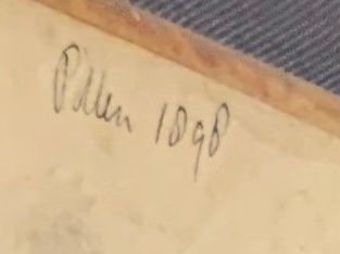 Photo of a small pencil inscription