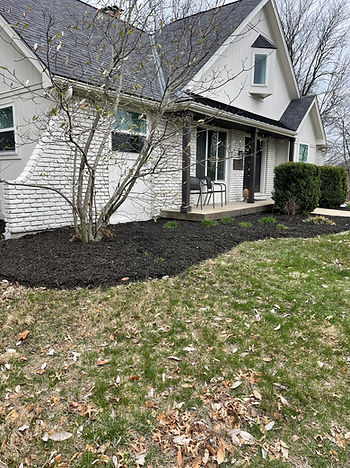 Lawn with fresh mulch in landscape beds
