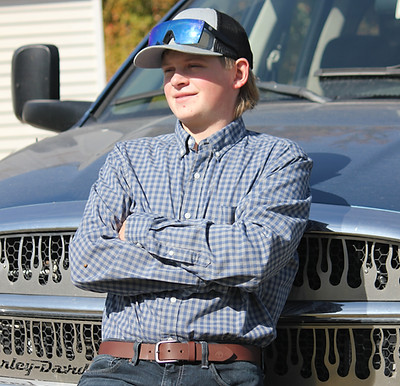 handsome guy in front of truck