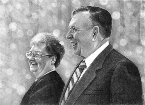 A graphite drawing of an older laughing couple