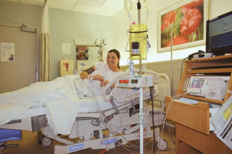 Labouring woman in bed with epidural