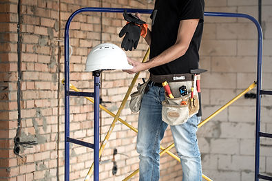 builder-handyman-with-construction-tools