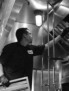 Professional Cleaner Cleaning Kitchen Hoods