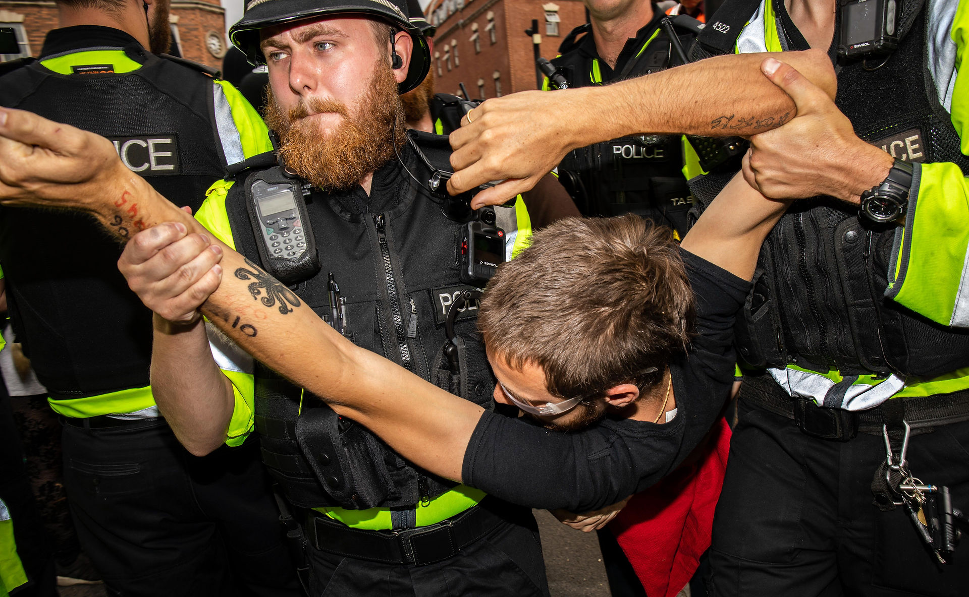Police remove a protestor from an Extinction Rebellion Protest. Captured by Jake McPherson for SWNS