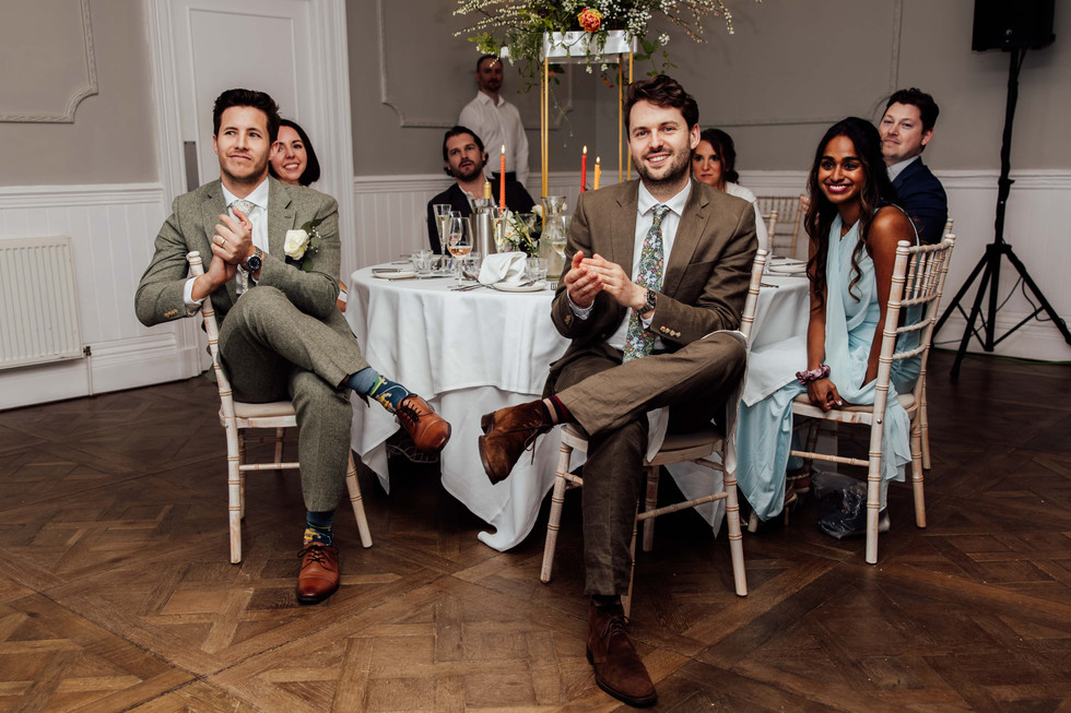 Guests clap after a speech at a wedding in St Ives, Cornwall. 