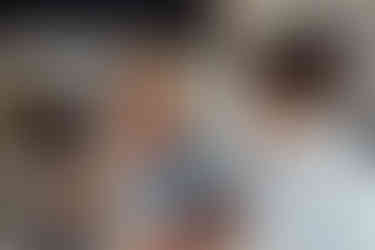 A bridesmaid cries and wipes a tear from her eye at The Carbis Bay Hotel in Cornwall