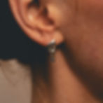 Drop earring in sterling silver - on model