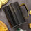 Thumbnail: Close-up of black and gold ceramic coffee mug, Nordic design, heat-resistant with stylish gift packaging