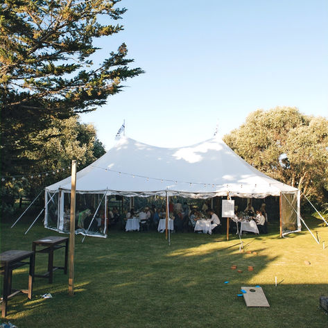 Wedding guests seated in the marquee