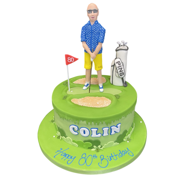 A creative golf-themed cake with fondant decorations including clubs, golf balls, and a lush green fairway, perfect for golf lovers' celebrations.