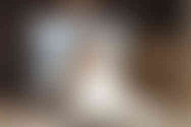 Central Iowa wedding photography - bridge poses on a podium in the bridal suite